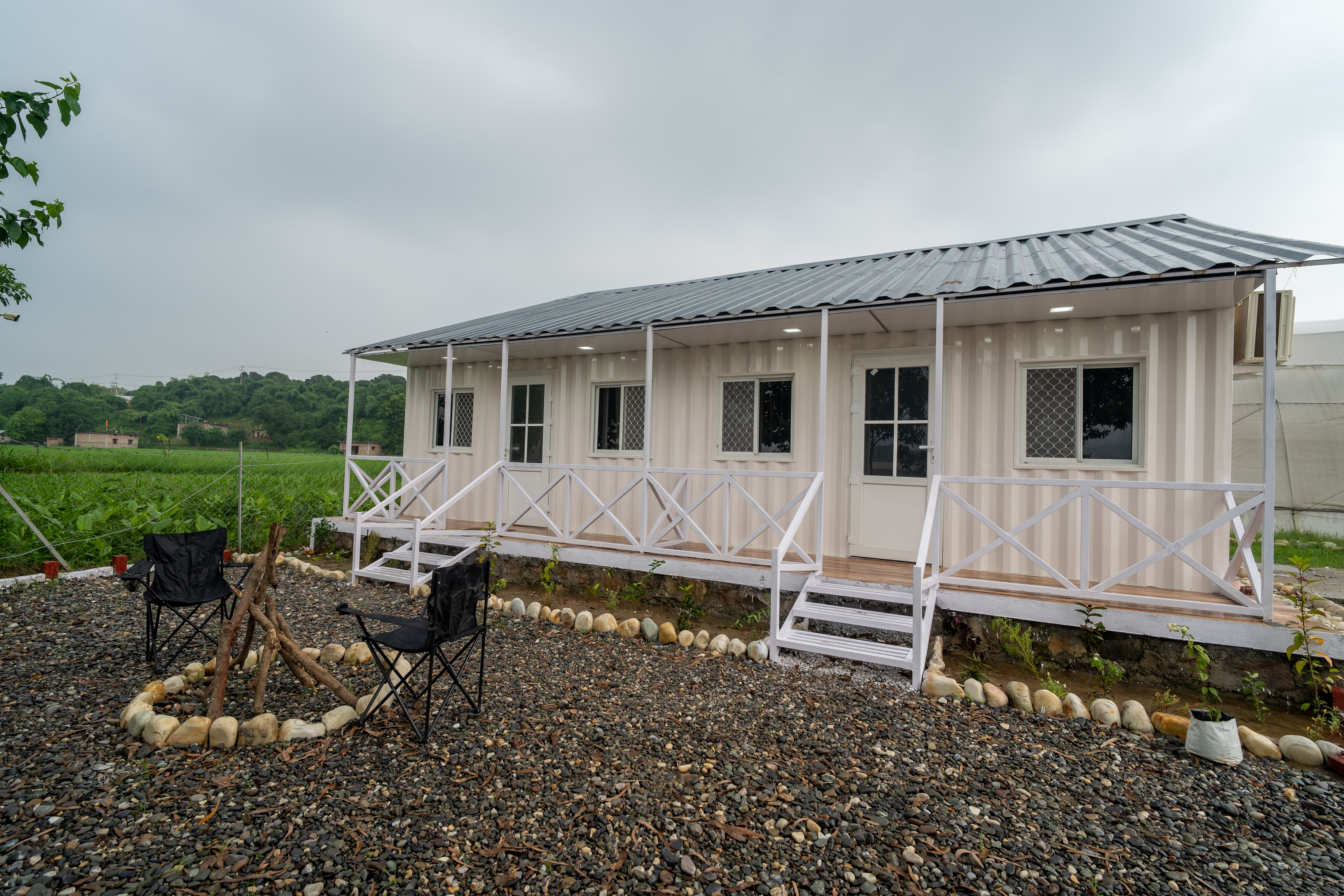 Mahasu Farms cottage exterior surrounded by greenery