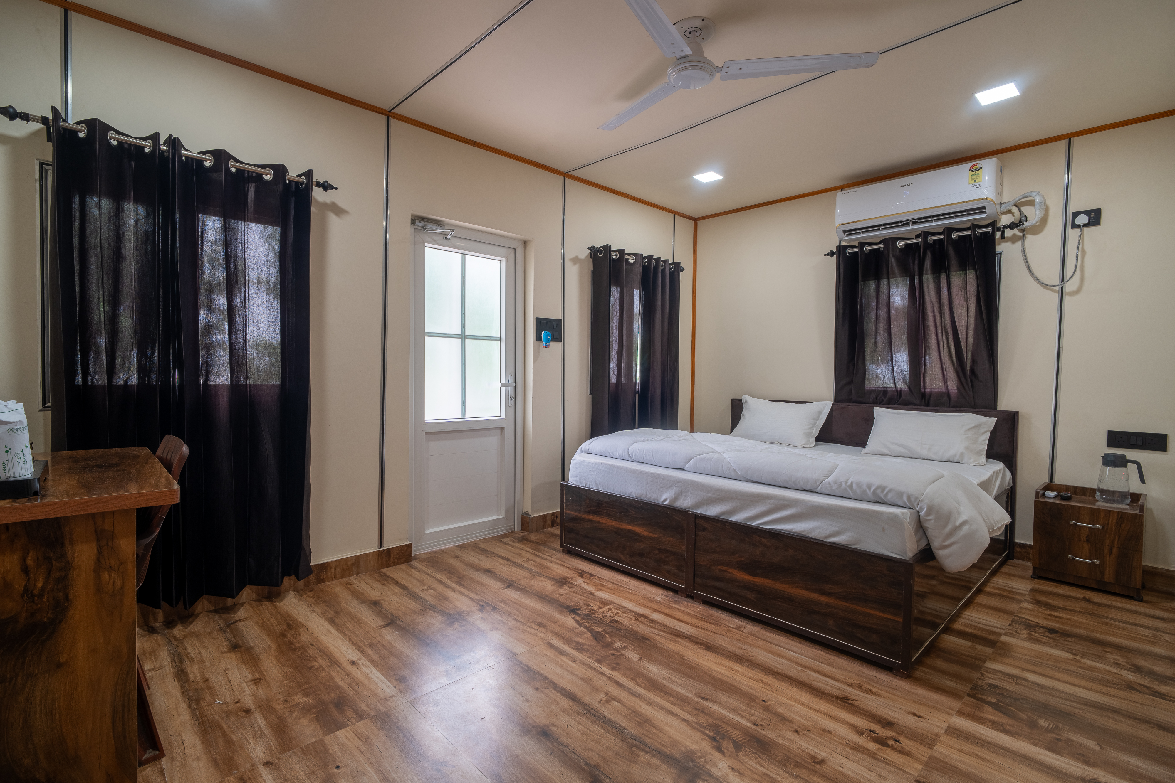 Comfortable bedroom and sitting area inside the cottage